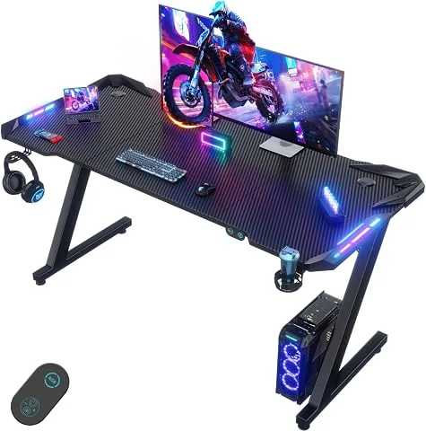 Devoko Escritorio Gaming con Luces LED, 140 x 60cm RGB Mesa Gaming Forma Z, Escritorio de Ordenador Grande con Gancho para Auriculares y Portavasos, Mesa Gamer para Oficina en Casa, Negro foto 2